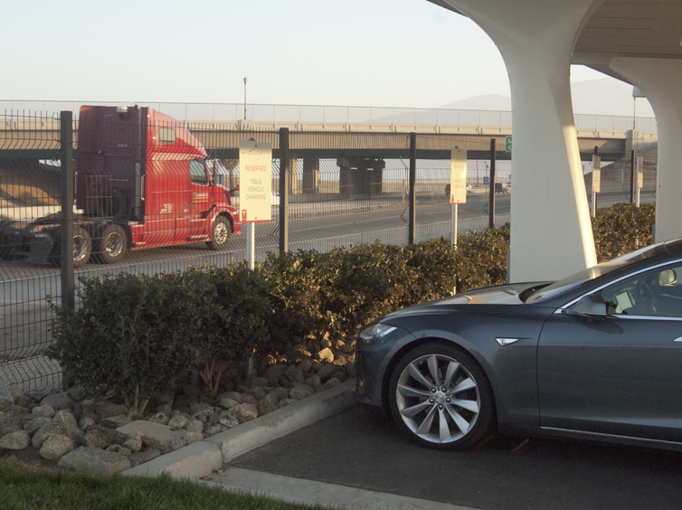 Tejon Ranch Solar Panel Covered Supercharger With Freeway View